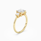 Cushion Classic Round Three Stone Large Sides in 14K Yellow Gold angled