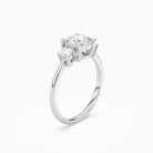 Cushion Classic Round Three Stone Large Sides in Platinum angled