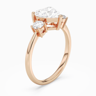 Heart Classic Round Three Stone Large Sides in 14K Rose Gold angled