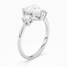Heart Classic Round Three Stone Large Sides in 18K White Gold angled