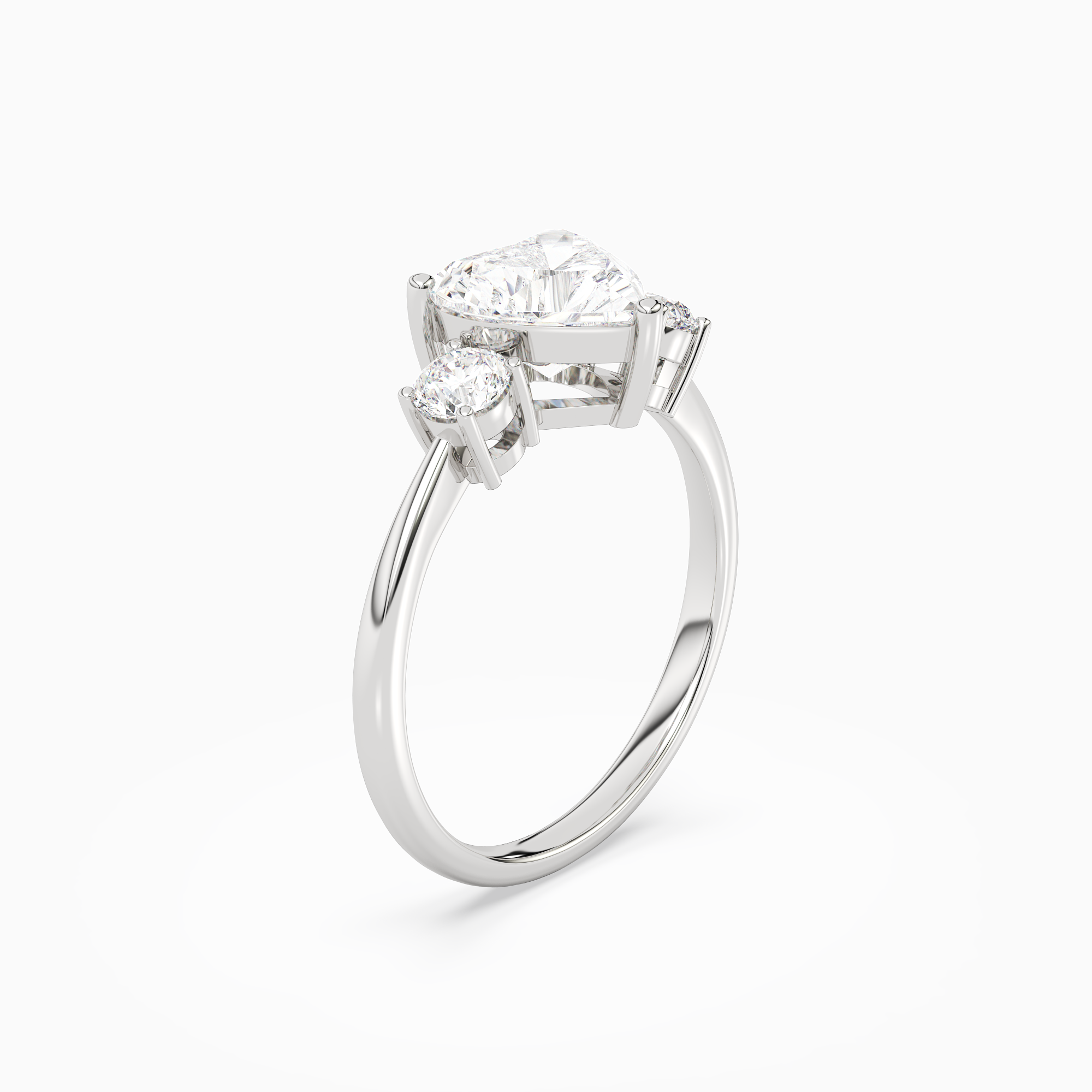 Heart Classic Round Three Stone Large Sides in Platinum angled