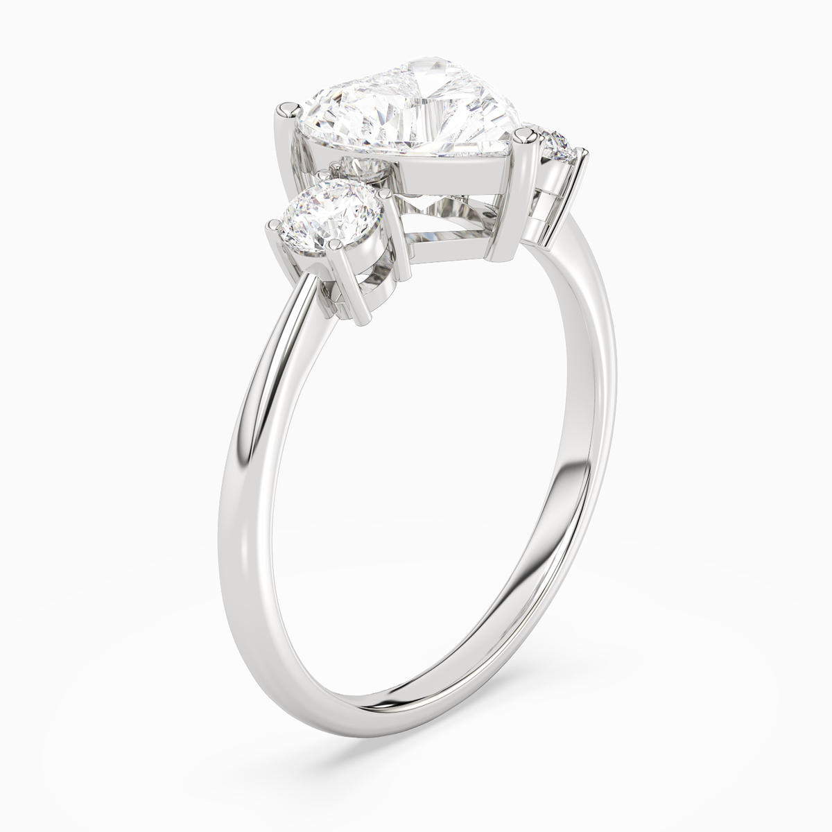 Heart Classic Round Three Stone Large Sides in Platinum angled