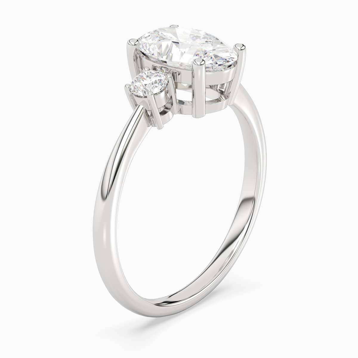 Oval Classic Round Three Stone Small Sides in Platinum angled