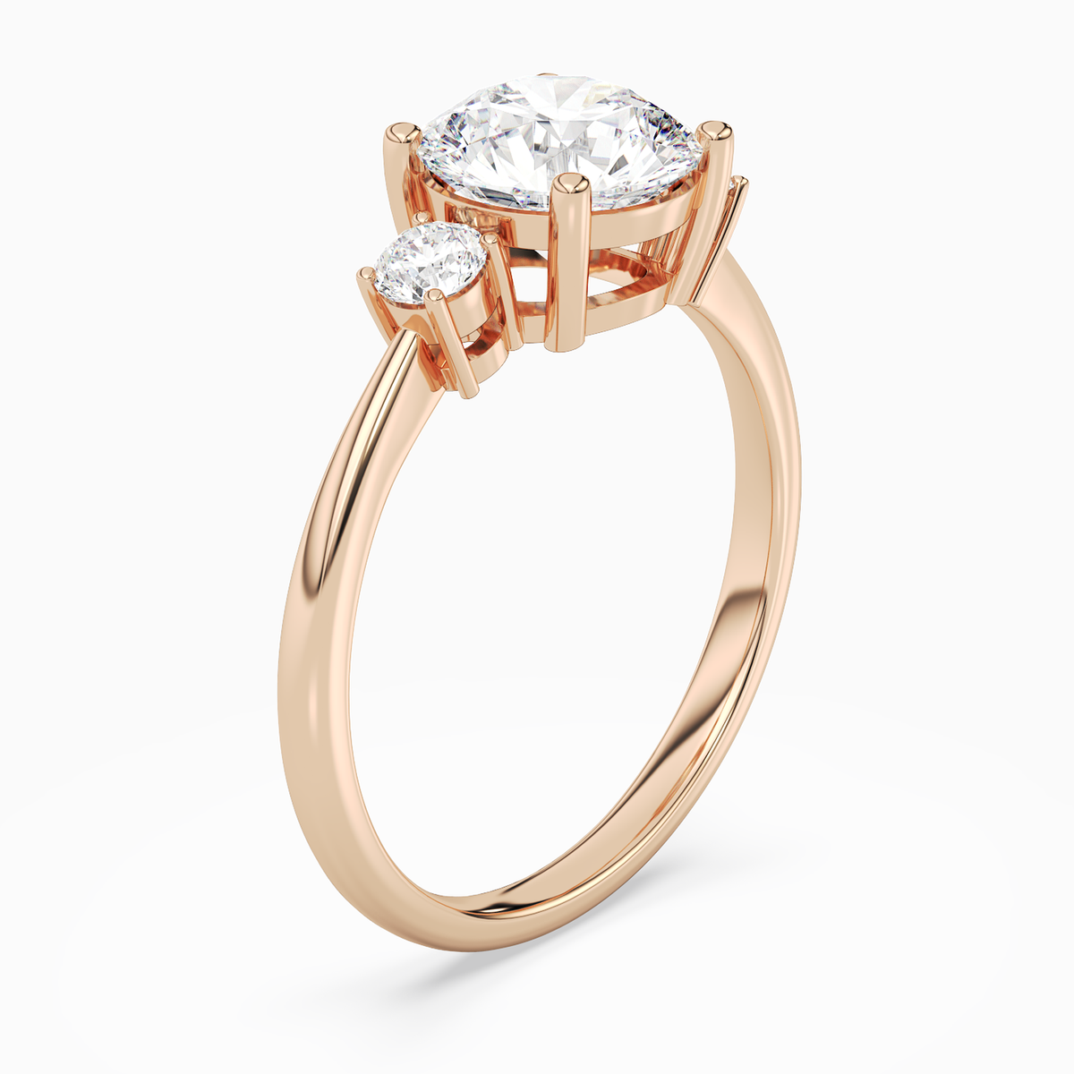 Round Classic Round Three Stone Small Sides in 14K Rose Gold angled