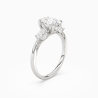 Oval Ornate Accented Three Stone in 18K White Gold angled