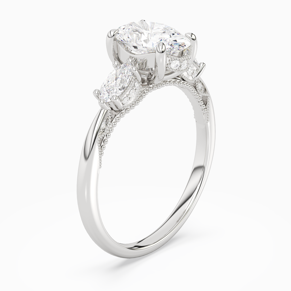 Oval Ornate Accented Three Stone in Platinum angled