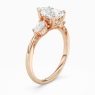 Pear Ornate Accented Three Stone in 14K Rose Gold angled