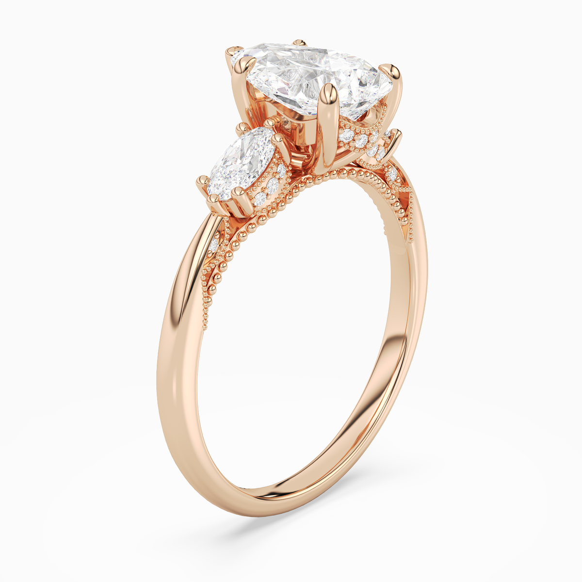 Pear Ornate Accented Three Stone in 14K Rose Gold angled
