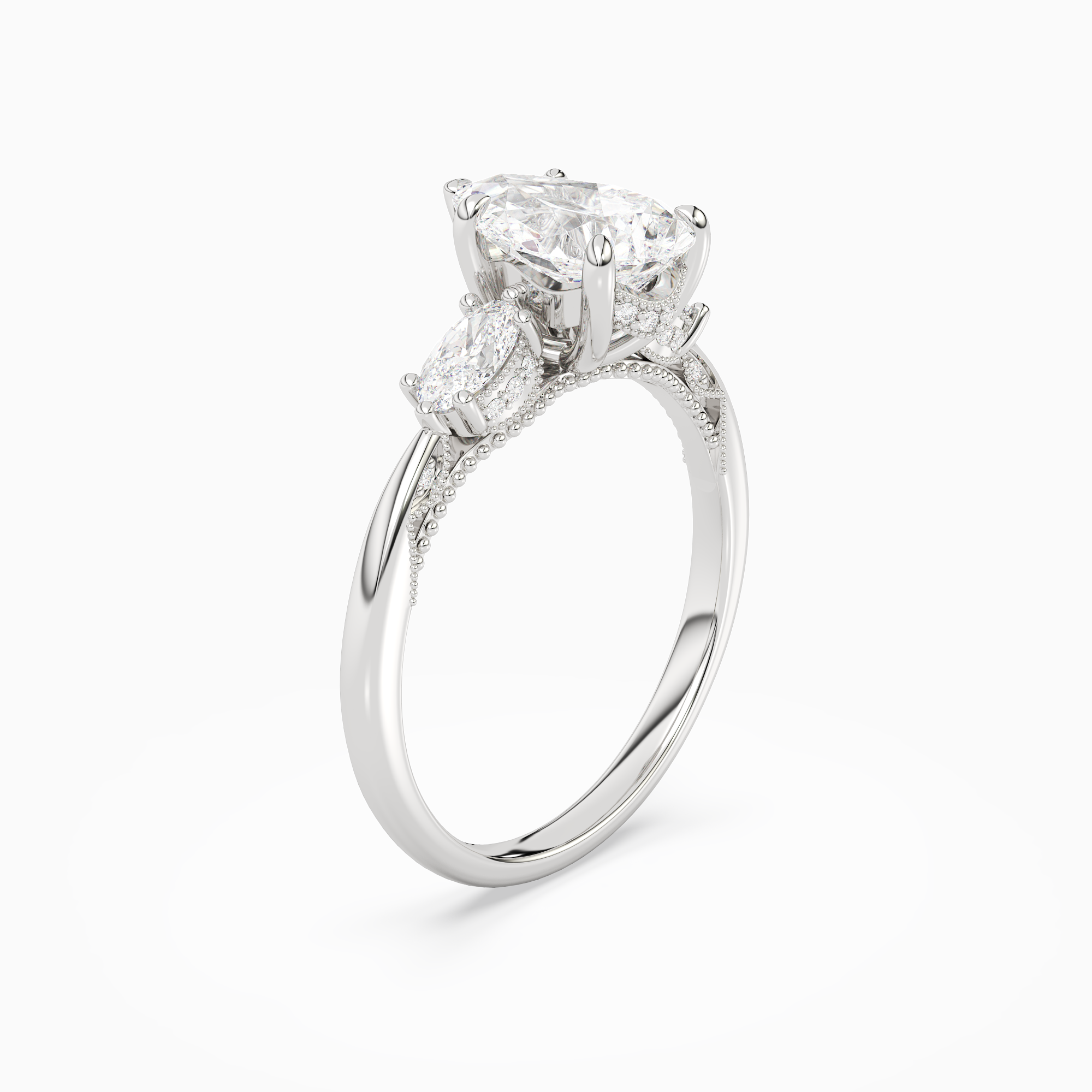 Pear Ornate Accented Three Stone in 18K White Gold angled