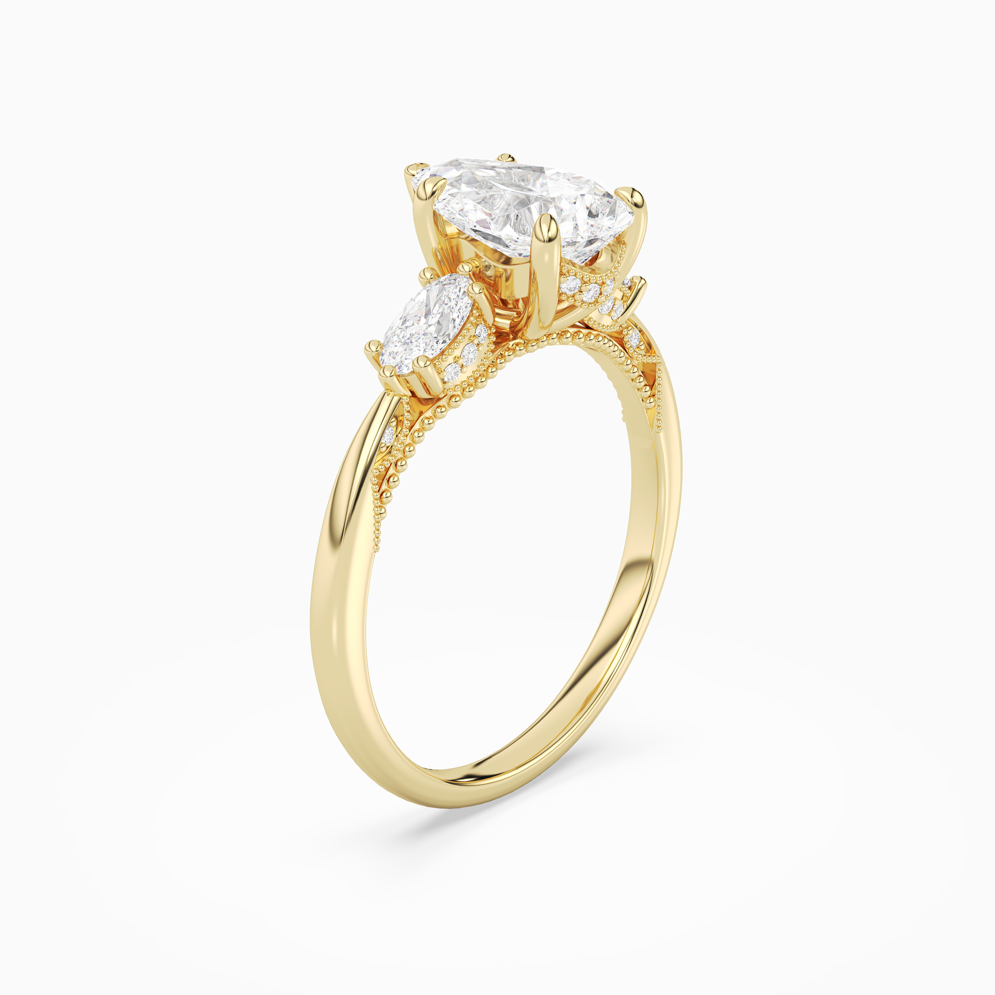 Pear Ornate Accented Three Stone in 18K Yellow Gold angled