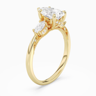 Pear Ornate Accented Three Stone in 18K Yellow Gold angled