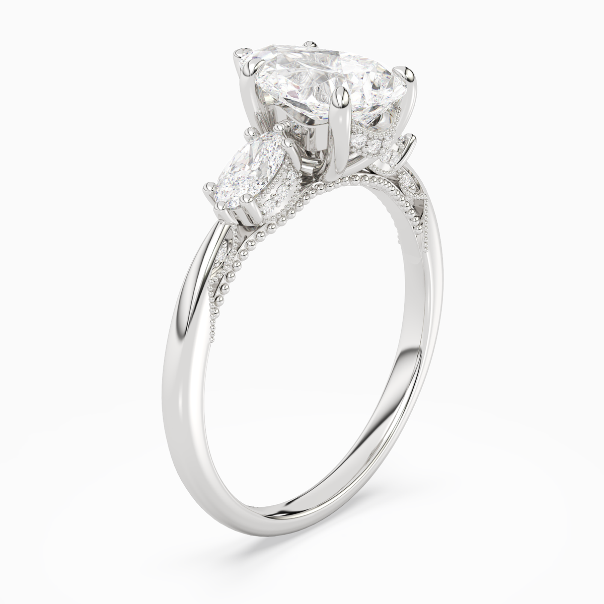 Pear Ornate Accented Three Stone in Platinum angled