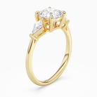 Cushion Kite Side Three Stone Large Sides in 18K Yellow Gold angled