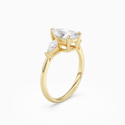Pear Kite Side Three Stone Large Sides in 18K Yellow Gold angled