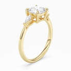 Cushion Kite Side Three Stone Small Sides in 14K Yellow Gold angled