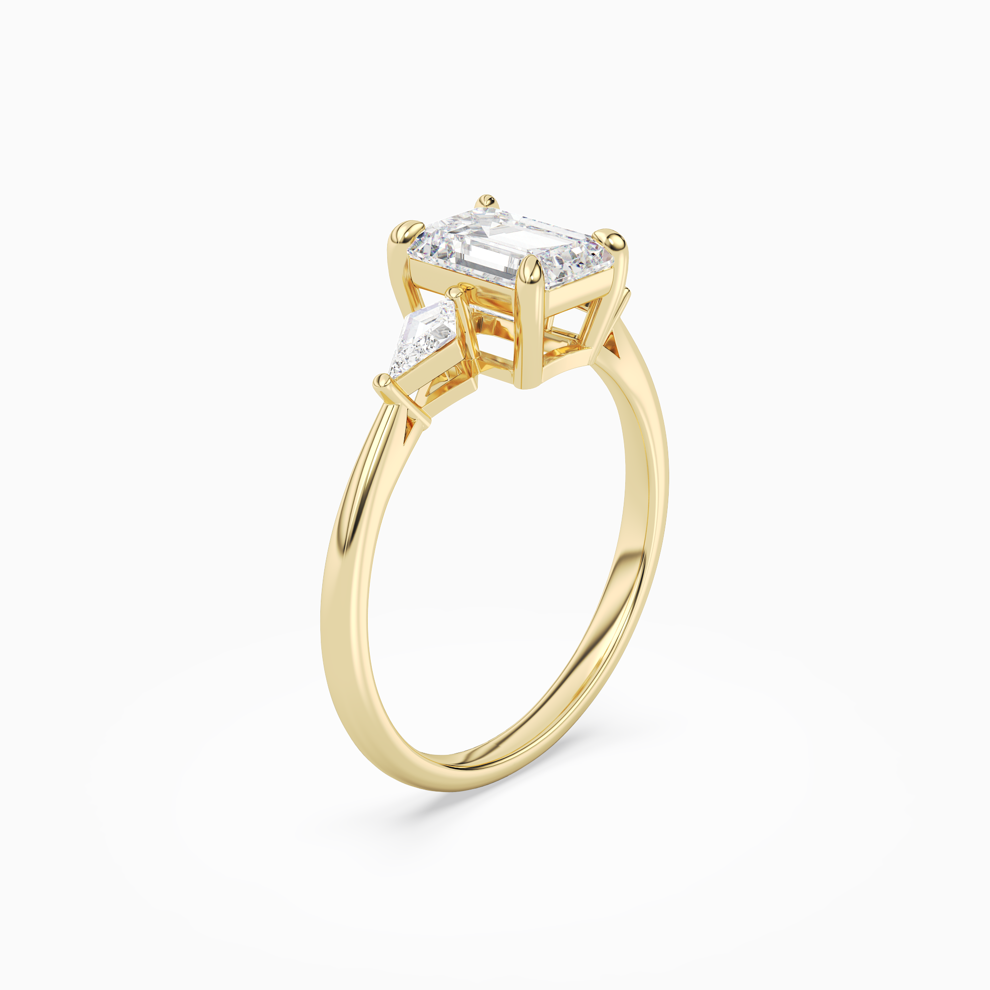 Emerald Kite Side Three Stone Small Sides in 18K Yellow Gold angled