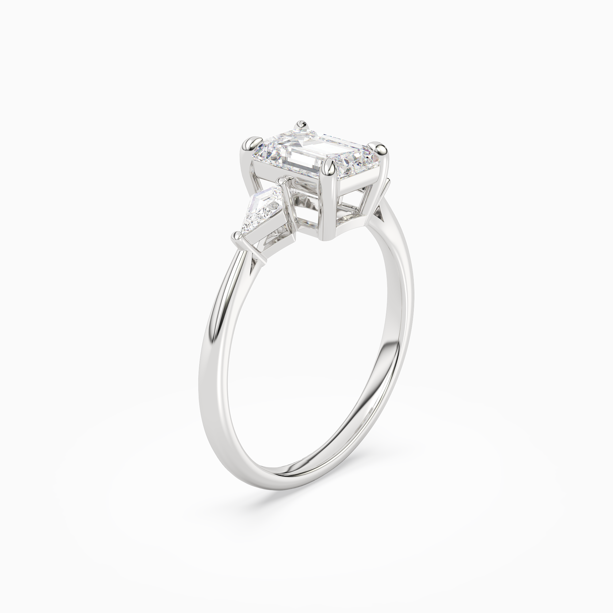 Emerald Kite Side Three Stone Small Sides in Platinum angled