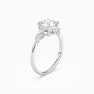 Round Kite Side Three Stone Small Sides in 18K White Gold angled