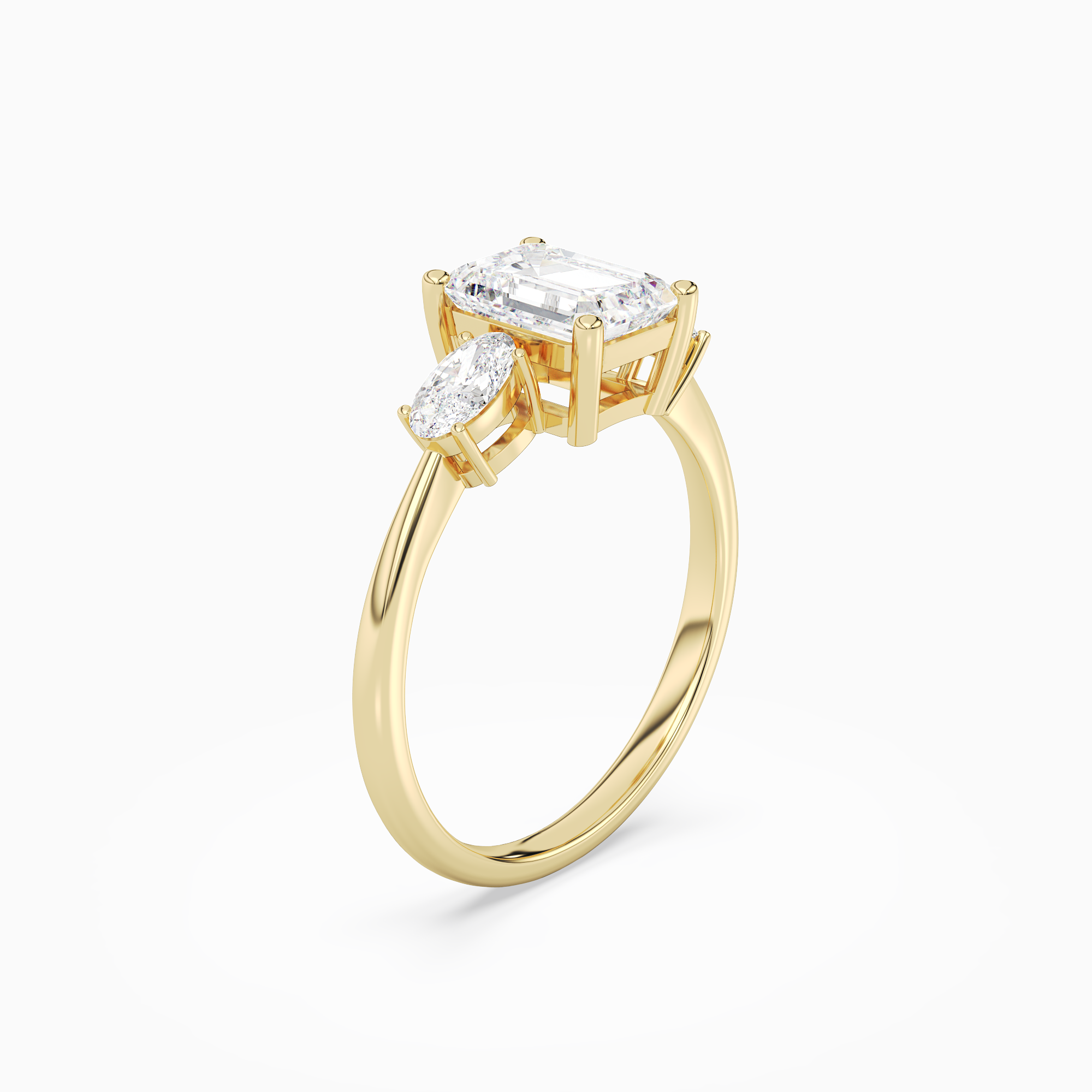 Emerald Classic Three Stone in 14K Yellow Gold angled