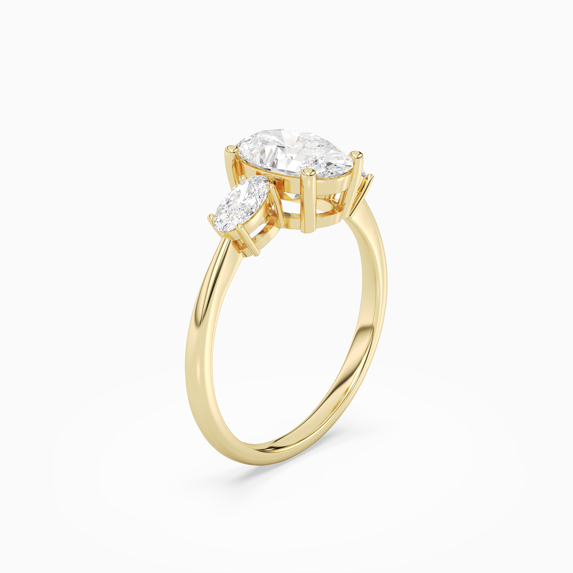 Oval Classic Three Stone in 14K Yellow Gold angled