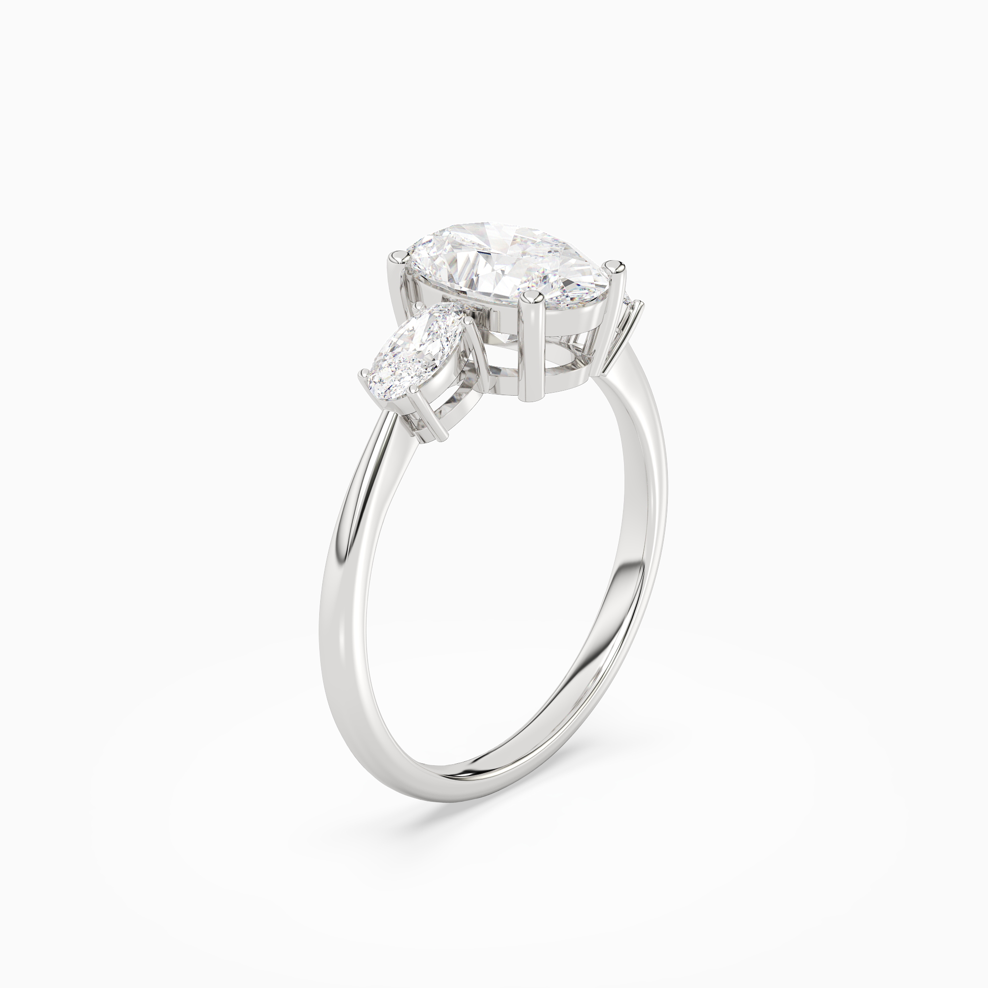 Oval Classic Three Stone in Platinum angled