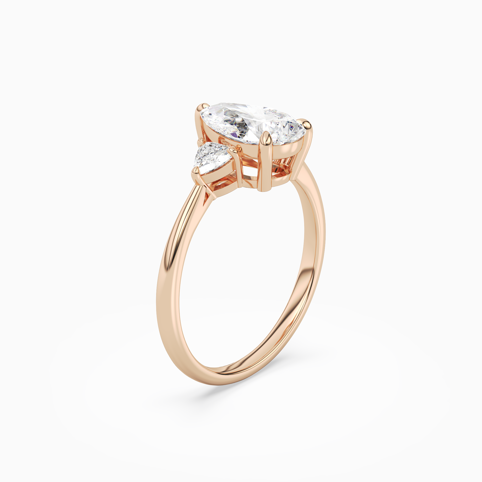 Pear Trillion Three Stone Large Sides in 14K Rose Gold angled