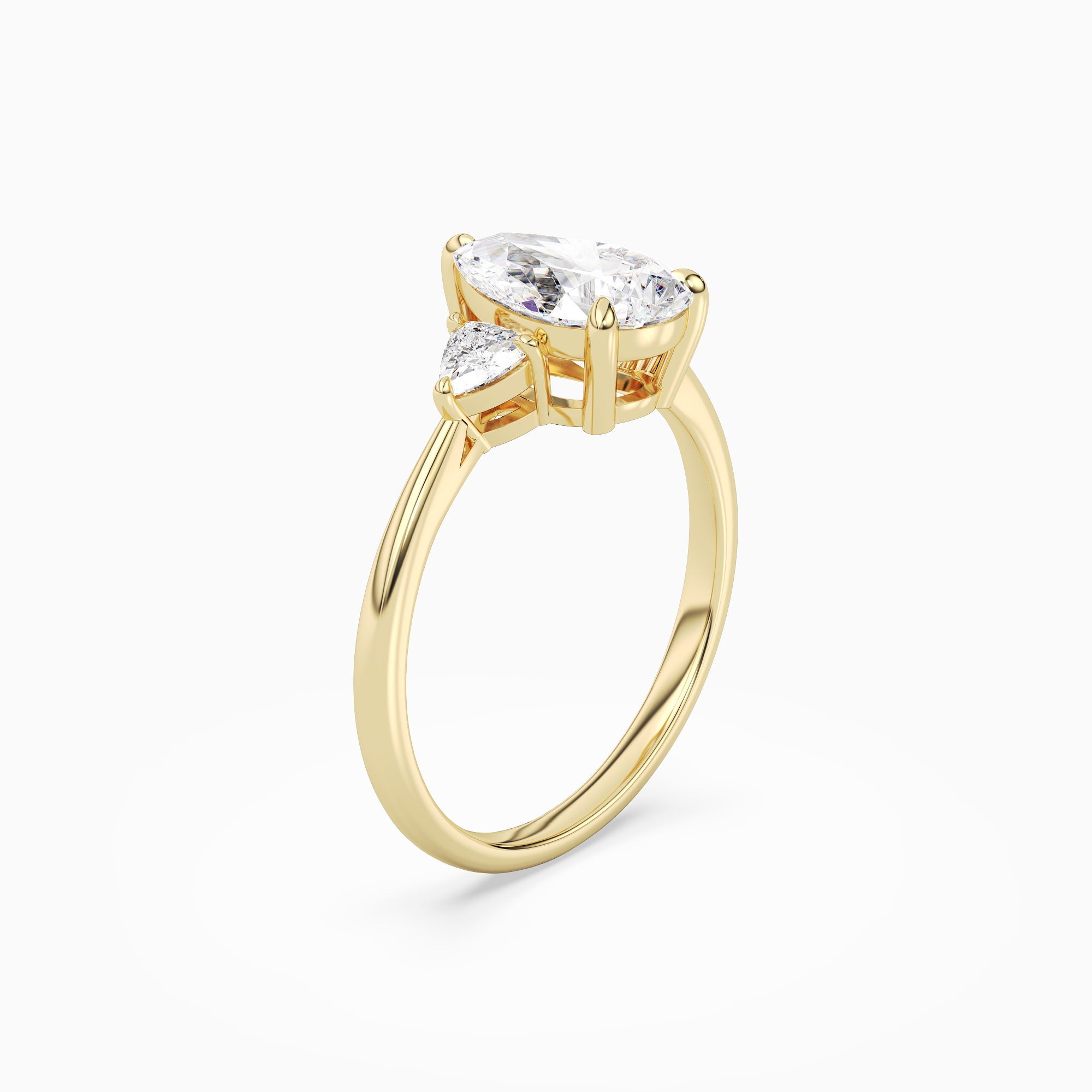 Pear Trillion Three Stone Large Sides in 14K Yellow Gold angled