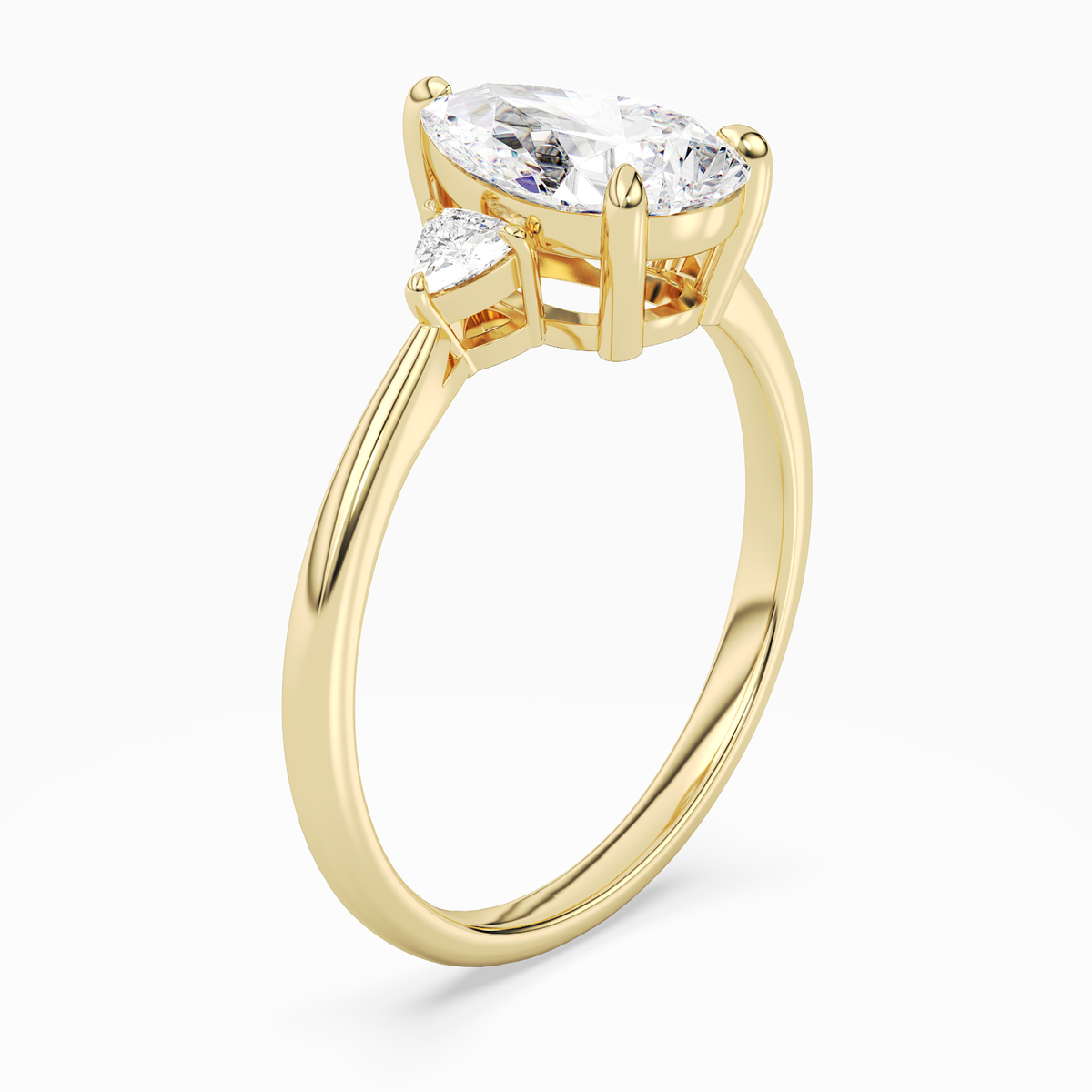 Pear Trillion Three Stone Small Sides in 18K Yellow Gold angled