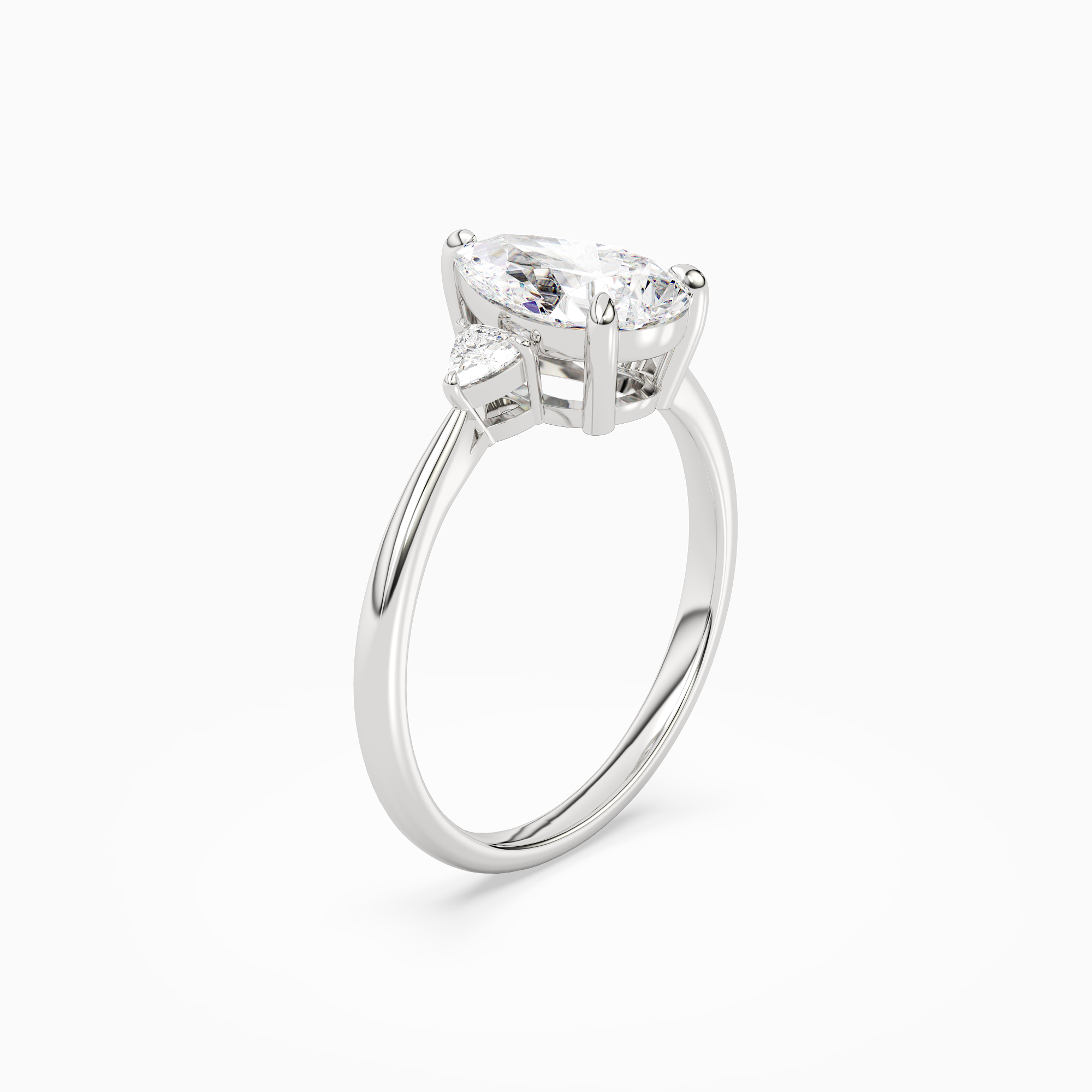 Pear Trillion Three Stone Small Sides in Platinum angled