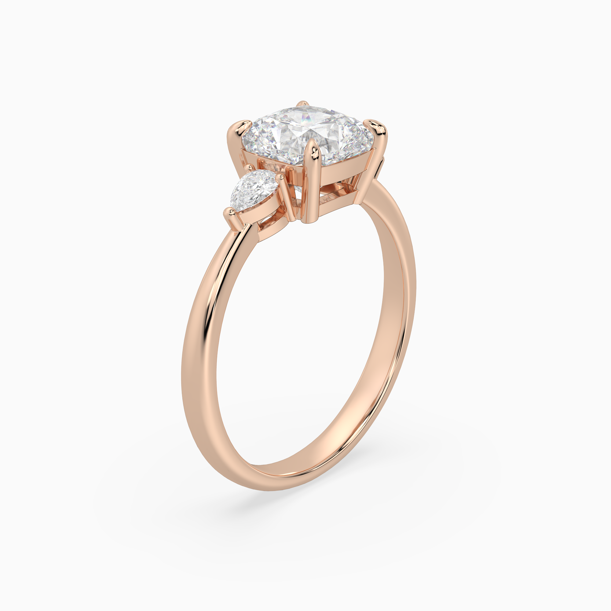 Cushion Pear Side Three Stone Classic in 14K Rose Gold angled
