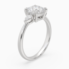 Cushion Pear Side Three Stone Classic in Platinum angled