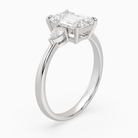 Emerald Pear Side Three Stone Classic in 18K White Gold angled