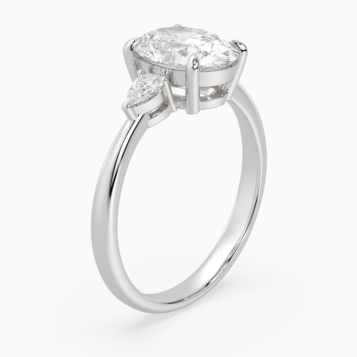 Oval Pear Side Three Stone Classic in 14K White Gold angled