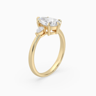Pear Pear Side Three Stone Classic in 14K Yellow Gold angled