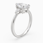 Pear Pear Side Three Stone Classic in Platinum angled