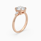 Round Pear Side Three Stone Classic in 14K Rose Gold angled