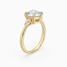 Round Pear Side Three Stone Classic in 14K Yellow Gold angled
