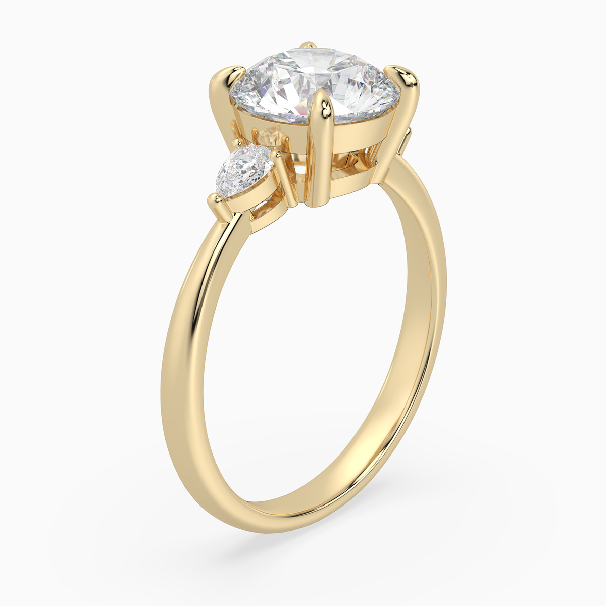Round Pear Side Three Stone Classic in 14K Yellow Gold angled