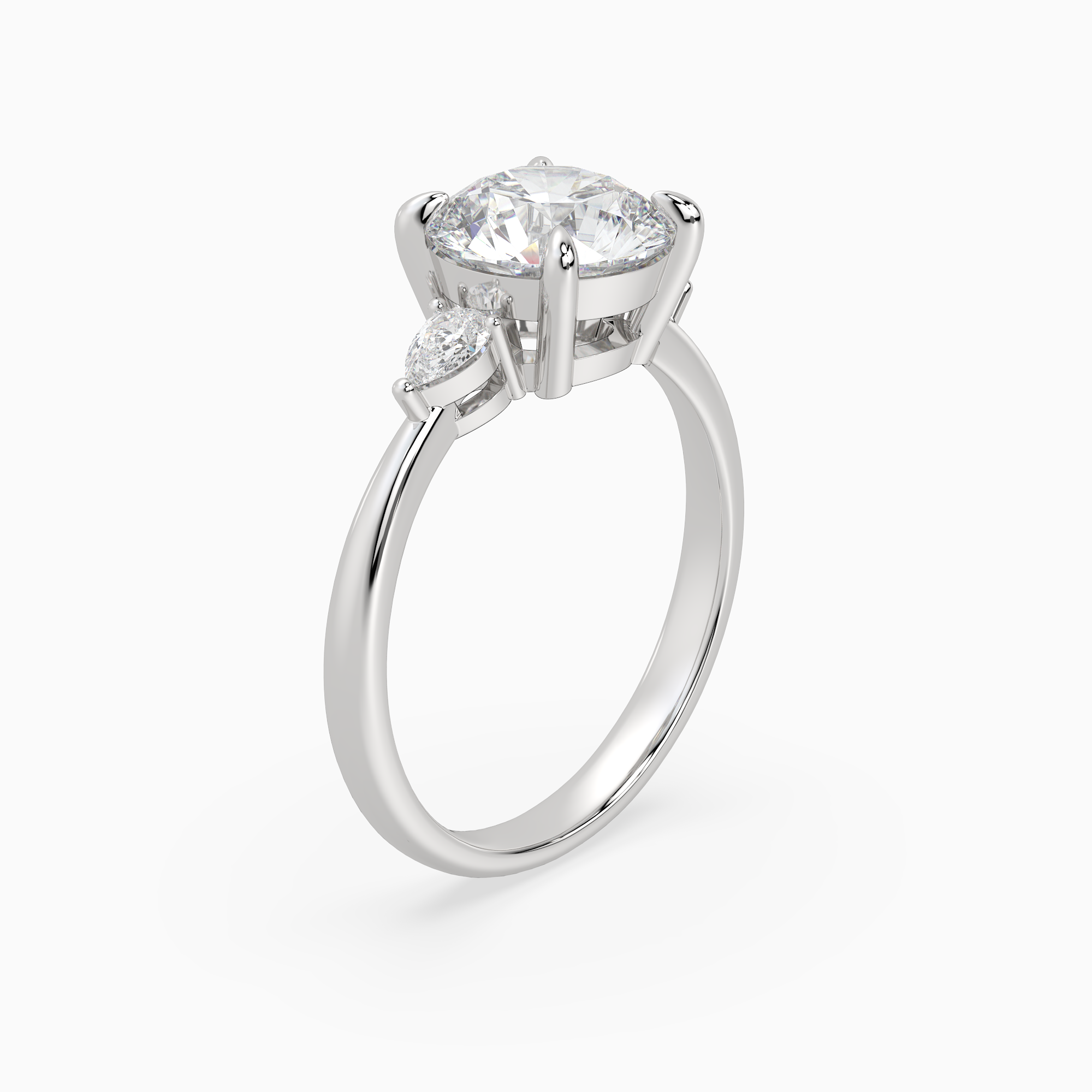 Round Pear Side Three Stone Classic in Platinum angled