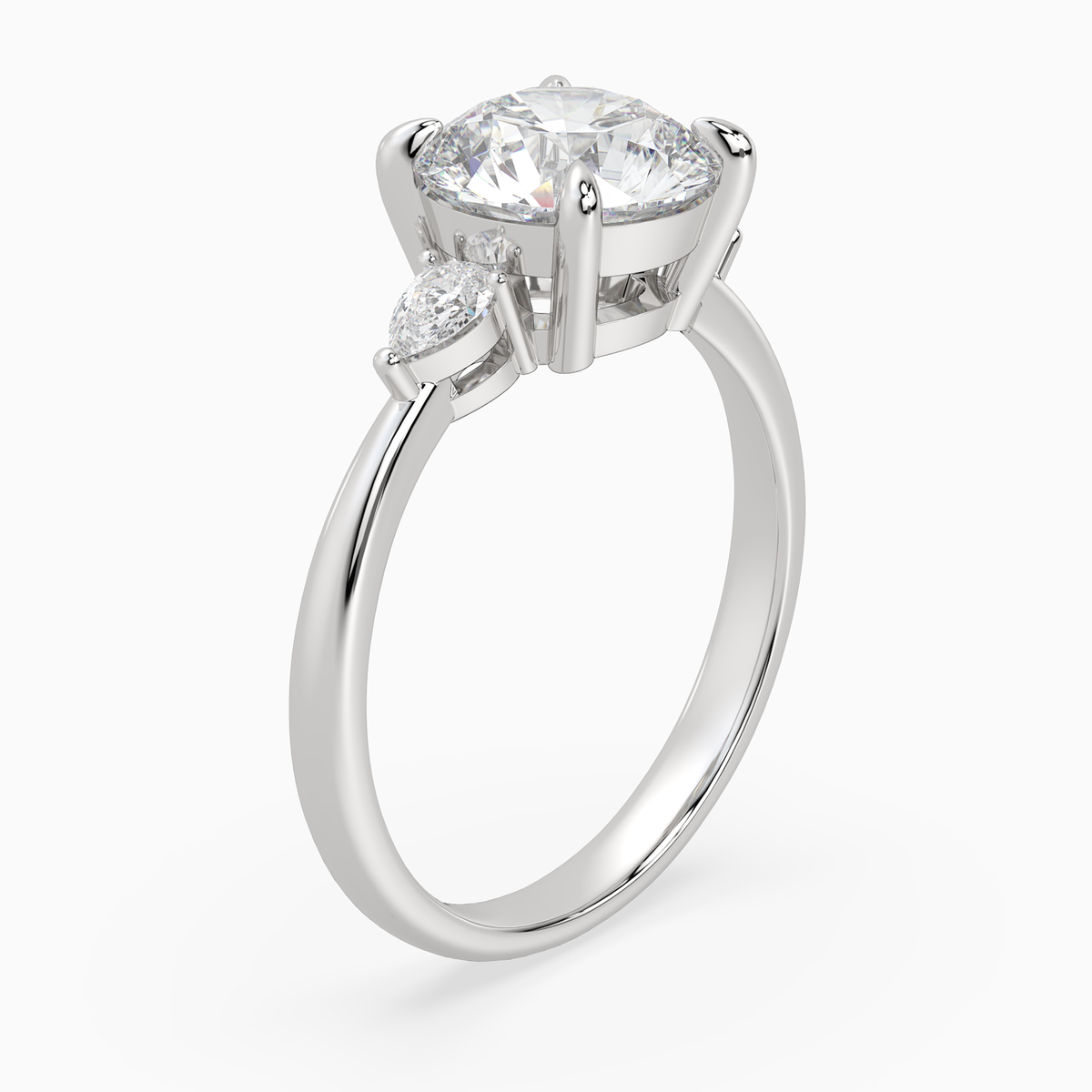 Round Pear Side Three Stone Classic in Platinum angled