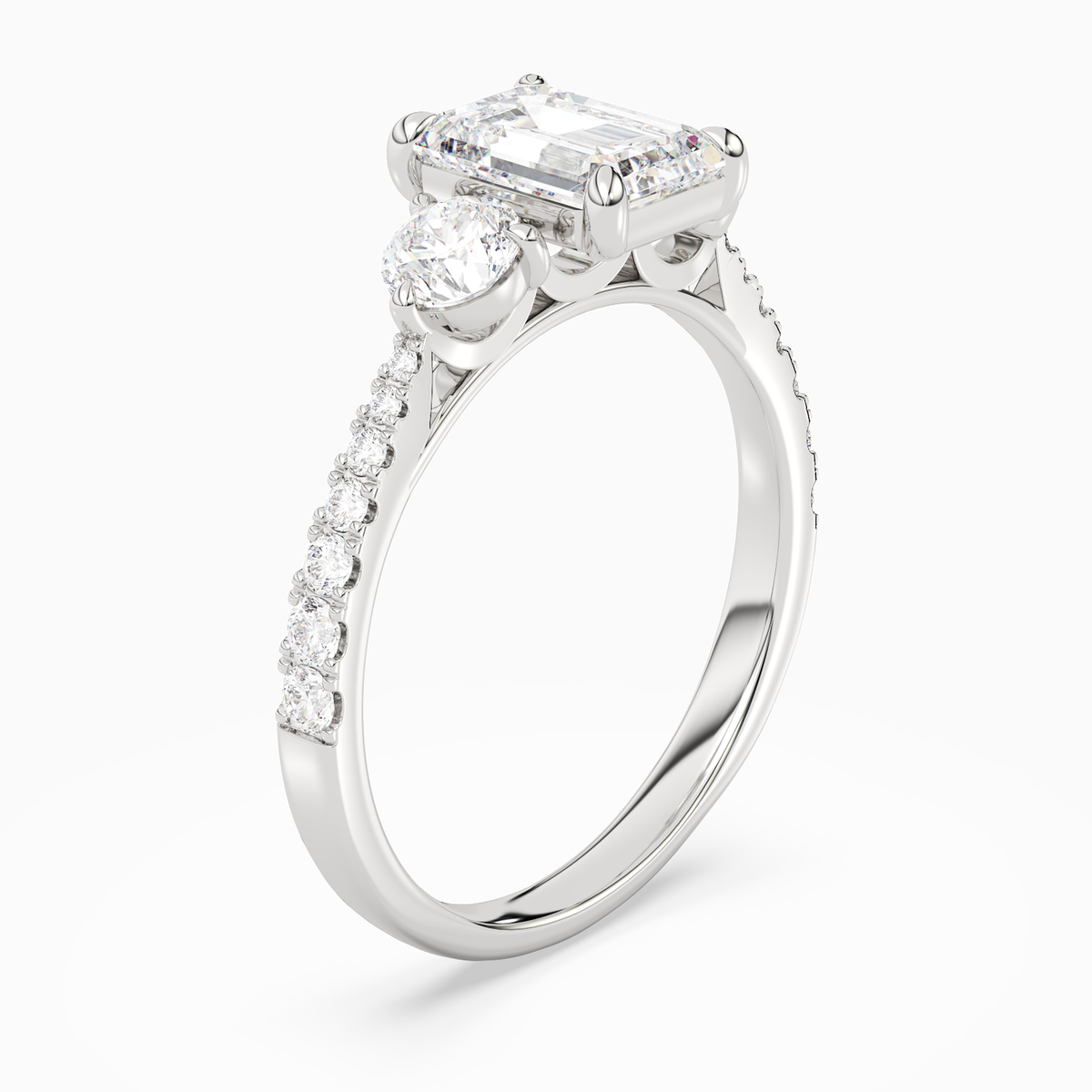Emerald Round Side Three Stone Pavé in 14K White Gold angled