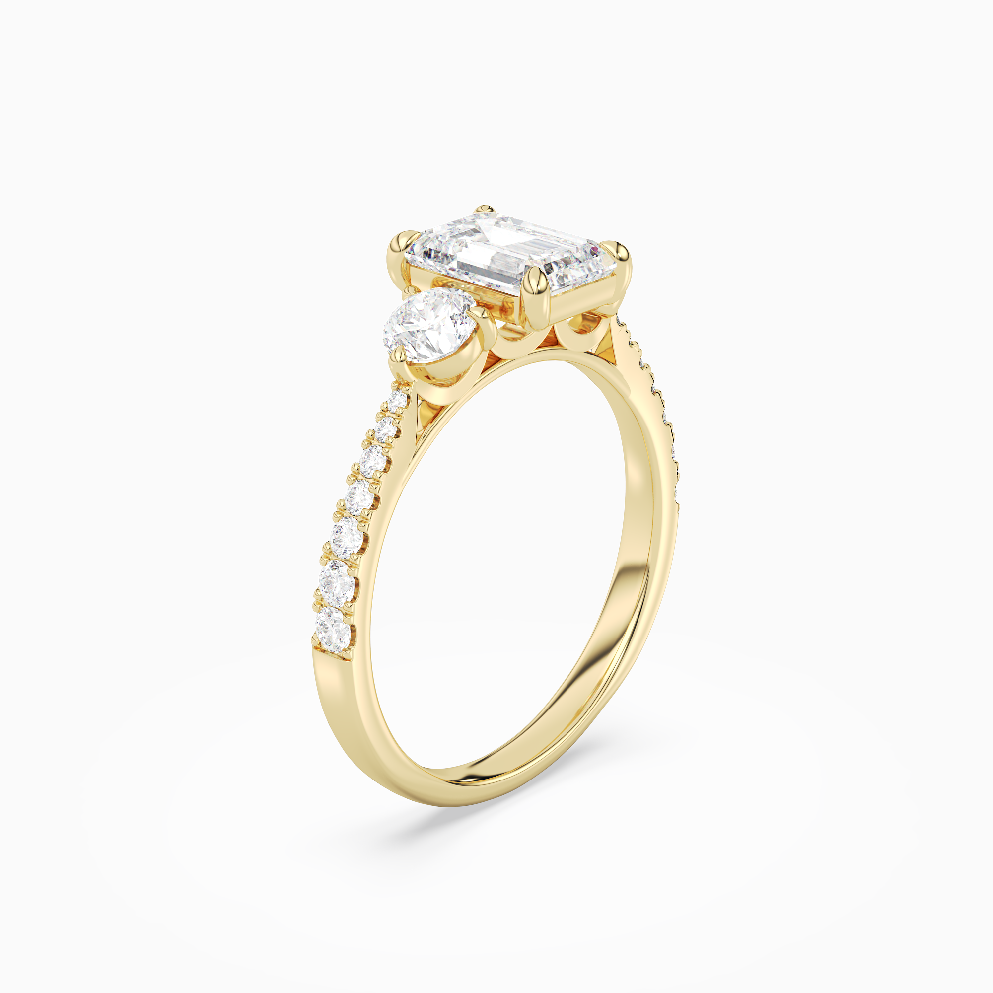 Emerald Round Side Three Stone Pavé in 14K Yellow Gold angled