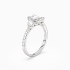 Emerald Round Side Three Stone Pavé in 18K White Gold angled