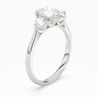 Oval Round Side Three Stone Plain in 18K White Gold angled