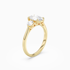 Oval Round Side Three Stone Plain in 18K Yellow Gold angled