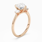 Heart Pear Three-Stone with Round Sides in 14K Rose Gold angled