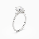 Heart Pear Three-Stone with Round Sides in 18K White Gold angled