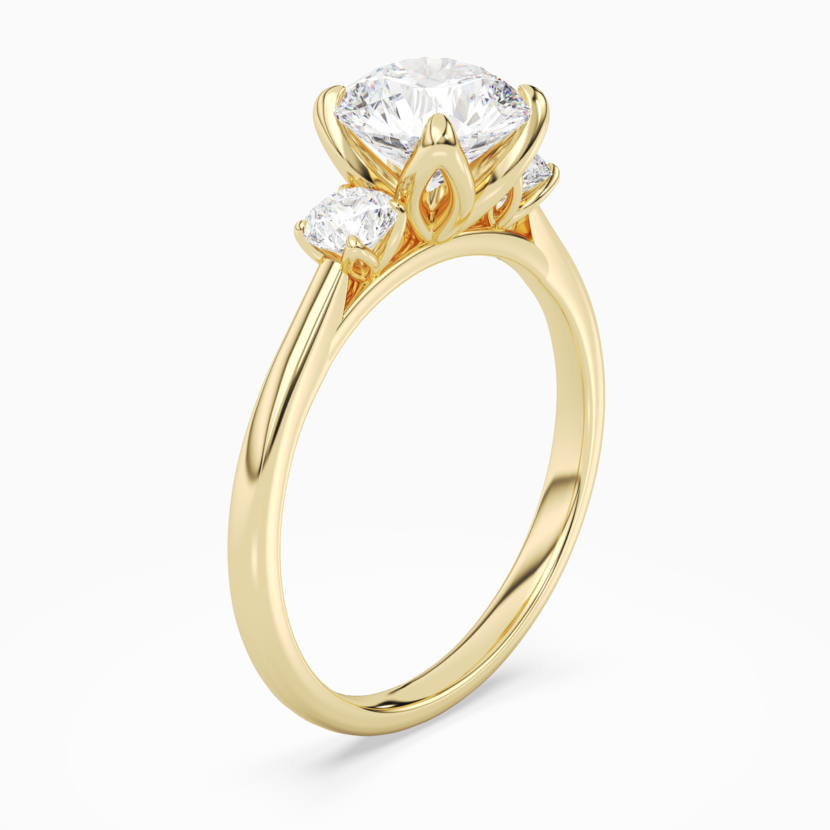 Round Pear Three-Stone with Round Sides in 14K Yellow Gold angled