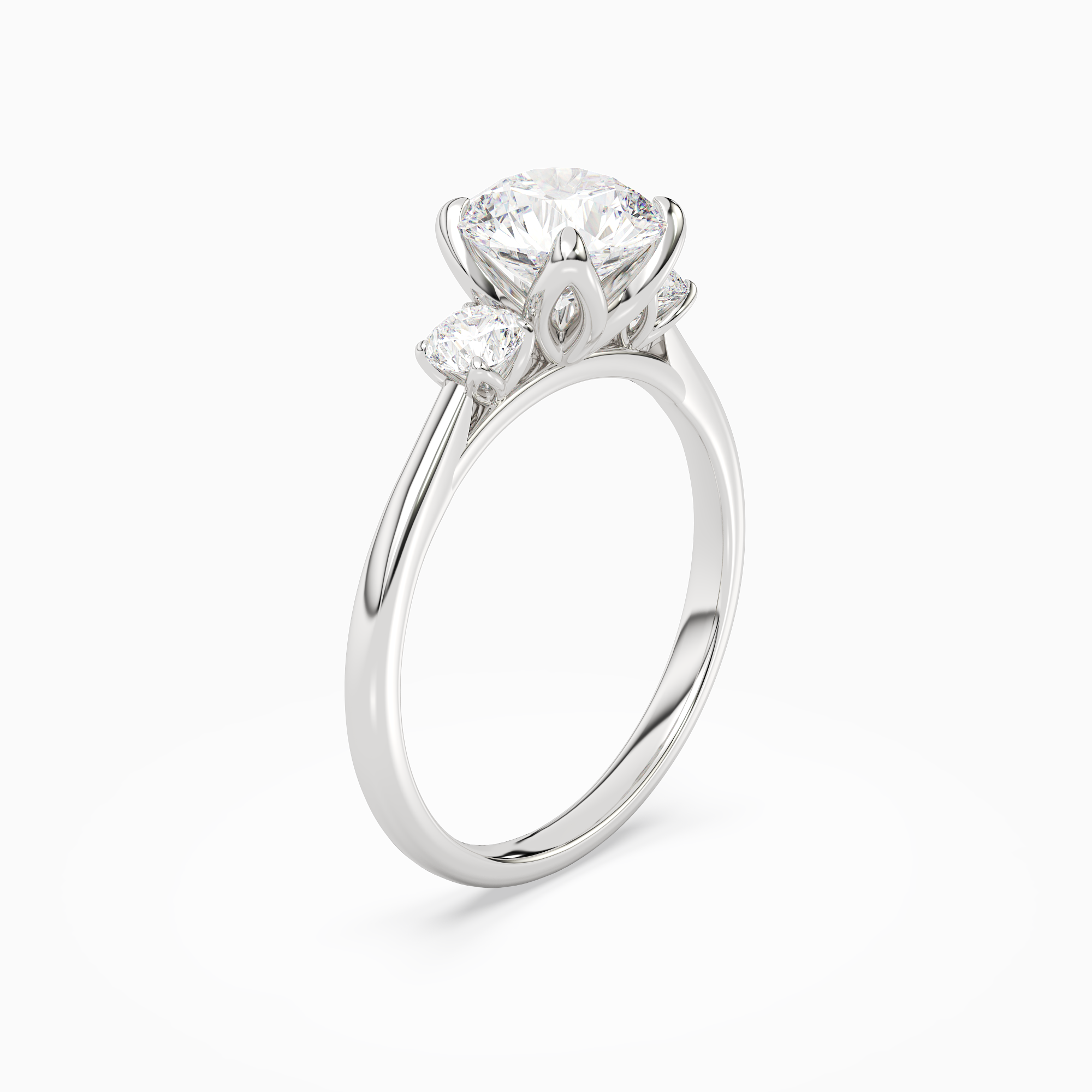 Round Pear Three-Stone with Round Sides in 18K White Gold angled
