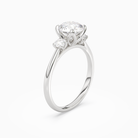 Round Pear Three-Stone with Round Sides in Platinum angled